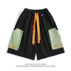 Shorts pour hommes Bandage vêtements de travail shorts Hong Kong style décontracté jeunesse demi-pantalon Cityboy hommes basket-ball Capris japonais vêtements de rue pantalons de marchandise J240322