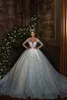 Magnifique illusion Scoop manches longues robe de mariée robe de mariée imprimés floraux scintillants princesse robes de mariée avec perles broderie dentelle