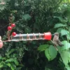 Andere vogelbenodigdheden Hummingbird Voedselhouder Ultralichte draagbare voerbak met bessenontwerp Eenvoudige installatie Handsfree voor eenvoudig