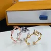 Conjunto de anéis femininos com novo design, flor da sorte brilhante, flor idílica pavimentada 3 em 1, anel de ouro e diamantes, joias de grife r0031