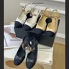 2024 Paris Designer Small C Sandales à talons moyens pour femmes Elegant Sandales Sandales de luxe aux talons hauts de printemps / été pour femmes