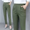 Calças femininas Capris Caprass Elastic Harem Pants de cintura alta Roupas de trabalho PLUS TAMANHO DE VELAMENTO CASUAL2403