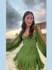 أنيقة جوفاء خارج الفانوس الأكمام الصغيرة درس أنيقة الصلبة الخامس الرقبة الأخضر الشبكات قصيرة الفساتين الربيع الصيف سيدة الشاطئ