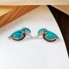 Boucles d'oreilles pendantes Vintage Style naturel bleu Turquoises oiseau femmes mignon Animal en forme de boucle d'oreille accessoires de fête bijoux cadeaux décor d'oreille