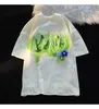 Kvinnors t-shirt Green Tie Dye Cartoon Embroidery T-shirt Knitting Flower Kawaii Tee O-Neck Loose Casual Summer Top Student Girl Korean Trend 240322