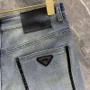 Yüksek kaliteli erkek kot tasarımcı pantolon erkekler ince küçük düz pamuklu gündelik denim pantolon moda logo logo grafik denimler pantolon