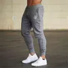 Sik Jogging Fiess Joggers pantalons de course hommes entraînement Sport Leggings vêtements de Sport pantalons de survêtement collants de musculation