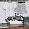 Classics baby clothes kids tracksuits summer Princess dress Size 90-150 CM Shiny letter logo girls T-shirt and Shiny silver short skirt 24Mar