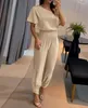 Tweedelige damesbroek modeset 2024 Nieuwste elegante klokmouwen Ruches Asymmetrische nekmouwen Korte tophoge taille met manchetten