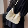 Sac à bandoulière asymétrique épaule dénudée pour femmes, sac seau texturé, polyvalent, nouvelle collection été 2023, populaire cette année