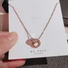 Collier en acier titane site de mode pour femmes simple rouge rose or serrure chaîne en os romain double anneau numérique cool vent Instagram cintre