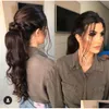 Ponytails cheveux malaisiens enveloppent autour du clip de queue de cheval dans les extensions 100% humaines ondulées bouclées 1B 100G-140G produits de livraison directe Dhwkd