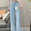 Nanyou högkvalitativ xiaoxiang broderi bantning rakt fit womens denim byxor korrekt version