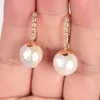 Kolczyki Dangle Ogromne perły słodkowodne barokowe perłowe 18 -karne złoto obręcz kryształowy formalny upusz