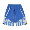 Shorts pour hommes Designer Marque Rhude Patchwork Lettre Imprimer Lâche Cordon Pill Zipper Basketball Sports Pantalons High Street Hommes et Femmes Capris Tendance