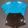 メンズファッショントラックスーツ技術セットデザイナートラックスーツシャツショーツ2ピースレディースフィットネススーツプリントクイック乾燥と通気性のあるスポーツウェアバスケットボールTシャツ