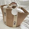 Straw Beach Basket Designer Sac Raphias Voyage Shopping Qualité Luxurys Sac à main Femmes Le sac fourre-tout Weave Pochette Embrayage Mens Bandoulière Sacs de week-end 10