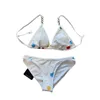 2024 meisjes strandkleding zomer gekleurde stippen merk zwempak bikini designer sexy bikini twee stukken badpak bodysuit spa zwembad party badpak