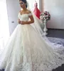Vintage off z koronki Afrykańskie suknie ślubne 2021 Plus Size Sweep Train koronki białe sukienki ślubne dla ogrodowego kraju abiti da sposa