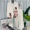 maison de vêtements à la maison bagages et lapins à chevrons de pyjamas de soie glaciaire adaptés aux femmes haut de gamme en manche longue2403