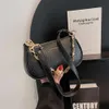 Designer Luxe mode draagtassen Portefeuilles Franse mode en elegantie Kleine tas 2023 Trendy en veelzijdige westerse kettingtas Damestas met enkele schouder