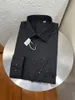 NYHETS DESIGNER Twist Button Shirt Fashion Casual Long Sleeved Polo Shirt Brand Slim Fit Luxury Shirt Silk Designer T-shirt M-3XL # YYJ33