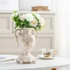 花瓶ヨーロッパの金メッキ象牙磁器の花瓶ヴィンテージ高度なセラミック花部屋の勉強廊下の家の結婚式の飾り