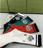Разноцветные модные дизайнерские мужские носки для женщин и мужчин, высококачественные хлопковые универсальные классические дышащие футбольные баскетбольные носки до щиколотки оптом RDJSTJA
