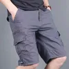 Pantaloncini da uomo 5XL Plus Uomo Sport all'aria aperta Cotone sciolto Spiaggia Sprint Estate Arrampicata Sportiva Multi tasca Cargo diretto Sprint 24323