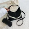 Designer Luxury Fashion Tygväskor handhållna kvinnors väska Instagram koreansk version Fashionabla godis färgad pärla hängande kedja kvinnospåse färskt och söt en ska