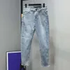 Jeans firmati Primavera di fascia alta Nuova rete Lettera ricamata rossa Stessi pantaloni jeans da uomo a gamba dritta slim fit per studenti versatili