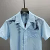 2024Spring/summer New Chest Pocket Letter Flower Print Men's Casual Short Sleeved Shirt Unisex Loose Fit