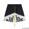 08vz Men's Shorts Rhude Patchwork Color Contrast Letter Printed Capris Straight Rope High Street Casual Summer Loose Straight Tube Mens and Womens Shorts