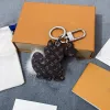 Anahtarlıklar kordonlar tasarımcısı sevimli sarı köpek modeli anahtar zincir zincirleri ring tutucu marka tasarımcıları için porte clef hediye erkekler kadın araba çanta kolye aksesuarları kutu yok mbp