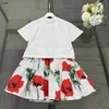 Vêtements de marque pour bébés, survêtements pour enfants, robe pour filles, ensemble deux pièces, taille 110-160 CM, motifs de fleurs rouges et de feuilles vertes, T-shirt et jupe courte 24 mars