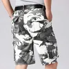 Shorts pour hommes Grande taille militaire hommes camouflage cargo shorts été nouveau Y2k rétro sac à dos sports de plein air décontracté genou longueur pantalon tactique 44 24323