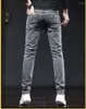 Herenjeans Grijs Denim Mannelijke elastische broek Mode Lange dunne High Street Small Feet-broek