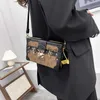 Sacs à bandoulière sac en PU sac pour femmes nouveau 2022 mode Rivet Texture INS une épaule bandoulière boîte sac H240328