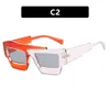 2 pcs Designer de luxe de mode Lunettes de soleil asymétriques à blocage de couleur 2023 nouvelles lunettes de soleil personnalisées avec lunettes de soleil hip-hop contrastées rouges Internet