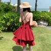 Robes décontractées Rouge évider robe à col en V sans manches femmes été mince spaghetti sangle croisée plage robe d'été bowknot mini laminé