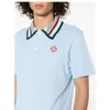 Hommes Polos Chemise Casablanca Nouveau Designer Marque Tendance Été Col Boutonné Slogan Brodé Imprimé Pull Lâche T-shirt À Manches Courtes Polo Casablanc Tops