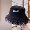 Summer Unisex Tassel Umyjane jeńcowe czapki wiadra moda dla kobiet szerokie grzbiet składana czapka panama na zewnątrz fishermans kapelusz 240311