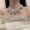 Chaînes Lumière Luxe Petite Foule Douce Et Cool Collier De Perles Double Couche Avec Un Grand Amour