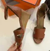 Sandales européennes et américaines de haute qualité chaussures pour femmes talon incliné en cuir de luxe sexy bout ouvert boucle de gladiateur chaussures pour femmes classiques 7CM sandales à talons hauts