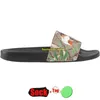 Sandalias Famoso Diseñador Mujeres Zapatillas para hombre 2024 Suela de engranaje plano Sandalia floral Tela de cuero de goma Sandale a rayas Zapatos de moda de verano Tamaño 36-45