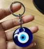 Taille 25MM 30MM 35MM 40MM personnalisé émaillé bleu mauvais œil porte-clés pendentif mode turc yeux du diable porte-clés cadeau accessoires