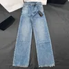 Shenzhen Nanyou Correct Edition Autunno/inverno Decorazione in metallo Jeans dimagranti a vita alta Abbigliamento versatile da donna alla moda