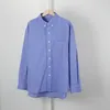 Blouses pour femmes texturé rayé bleu coton boutonné chemise polyvalente pour hommes et femmes haut ample à manches longues