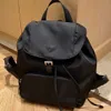 Bolsa de ombro designer marca quente feminina nova moda náilon mochila pendulares grande capacidade couro brilhante