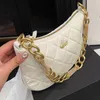 23A Designer Women Gold Hardware Tassel Chain Sheepskin Mönster Vintage Hobos UnderarRarm Bag Avancerad elegans diamantgitter axelväska handväska 25x15cm